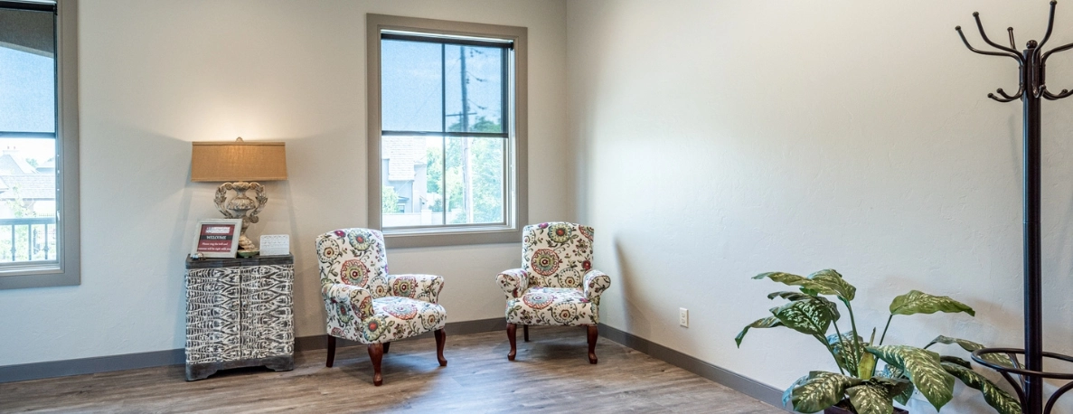 An office kitchen at a commercial building that was renovated back to its original luster by Hill Construction Solutions.